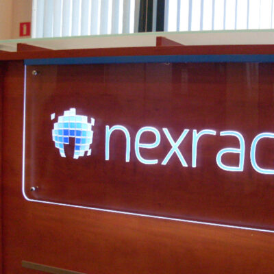 Illuminated logo at the reception